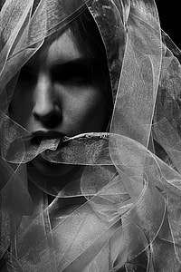 grayscale photo of woman wearing mesh veil