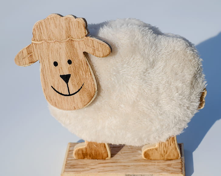brown and white sheep soft ride on toy