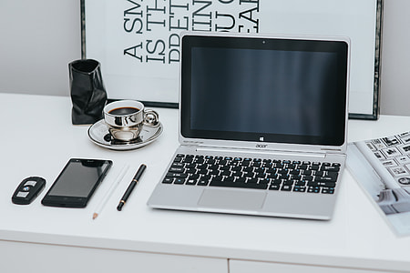 Laptop computer on white desk