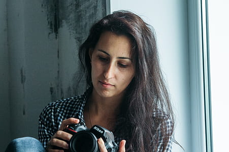 Woman Holding Nikon Dslr Camera
