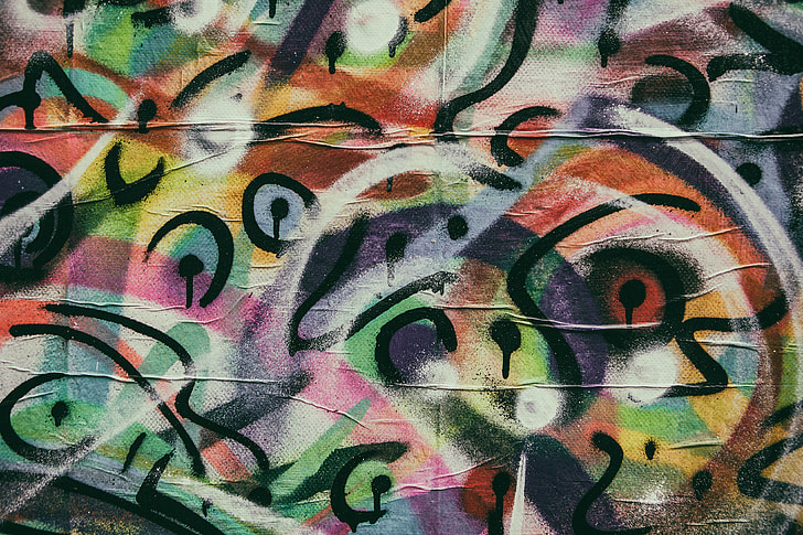Close-up shot of colourful paint swirls