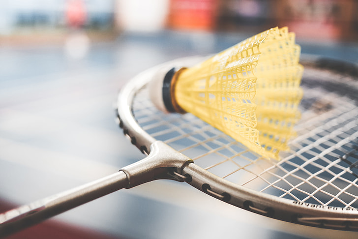 Badminton Racket and Yellow Shuttlecock Close Up