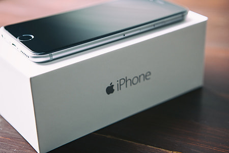 Close-up shot of the iPhone 6 mobile smartphone and original box
