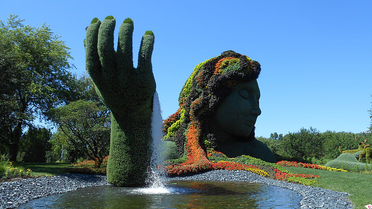 woman and hand topiary panorama photography