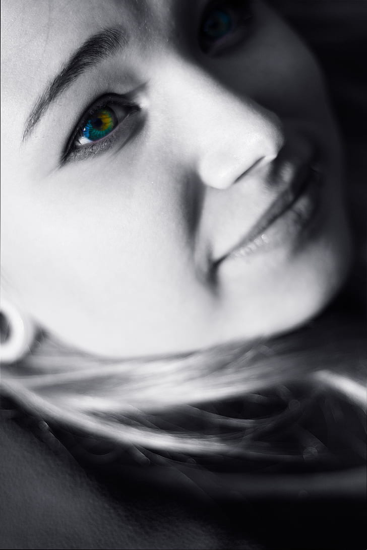 selective color photography of woman's eye