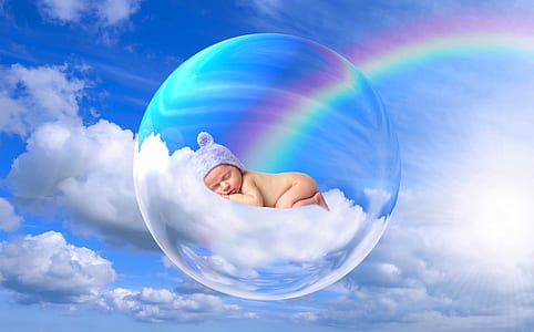 baby sleeping on clouds