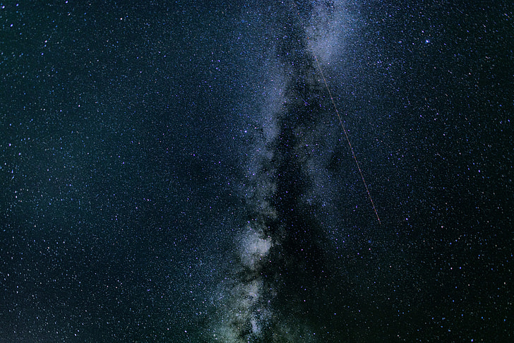 time lapse photography of shooting star