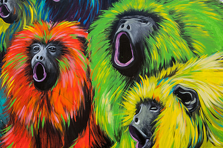 Close-up crop shot of some street art monkeys. Image captured in Brick Lane, London, England
