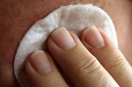 white textile on person skin