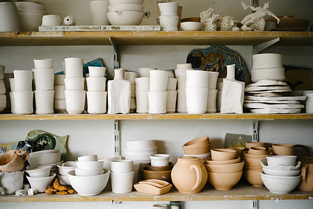 assorted ceramic dinnerwares on shelf