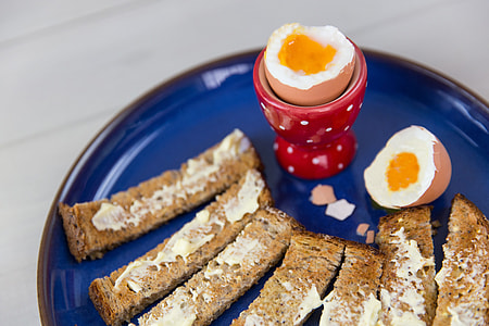 Boiled egg and toasted ‘soldiers’ bread breakfast