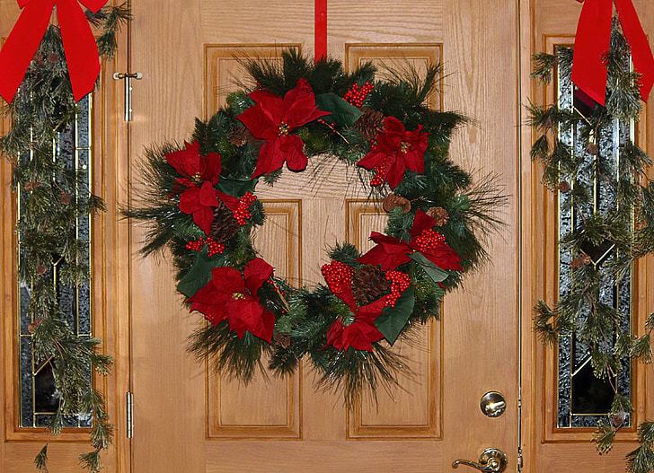 red and green wreath on door