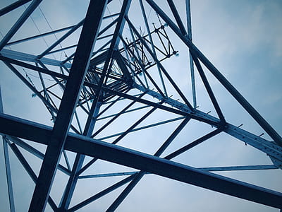 Low Angle View of Electricity Pylon Against Sky