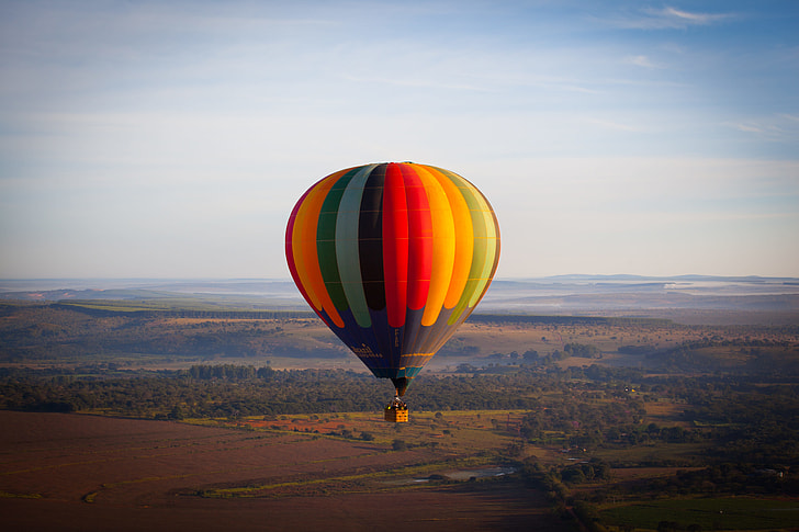 yellow, red, and green hot air balloon
