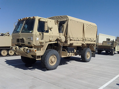 brown warfare truck photo during day time