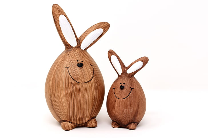 two brown wooden animal decors