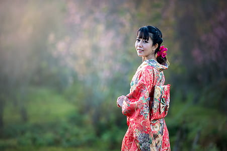 woman wearing pink and green floral kinomo traditional dress