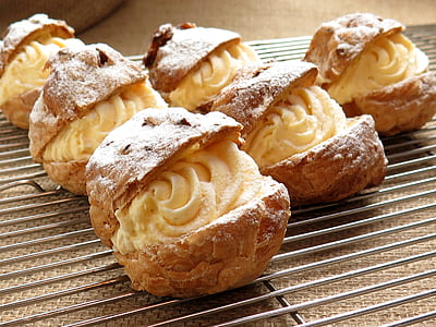 brown pastries with white icings