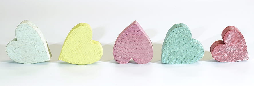 five assorted color heart party favors