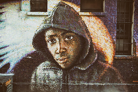 Street Art depicting a man wearing a hoodie top