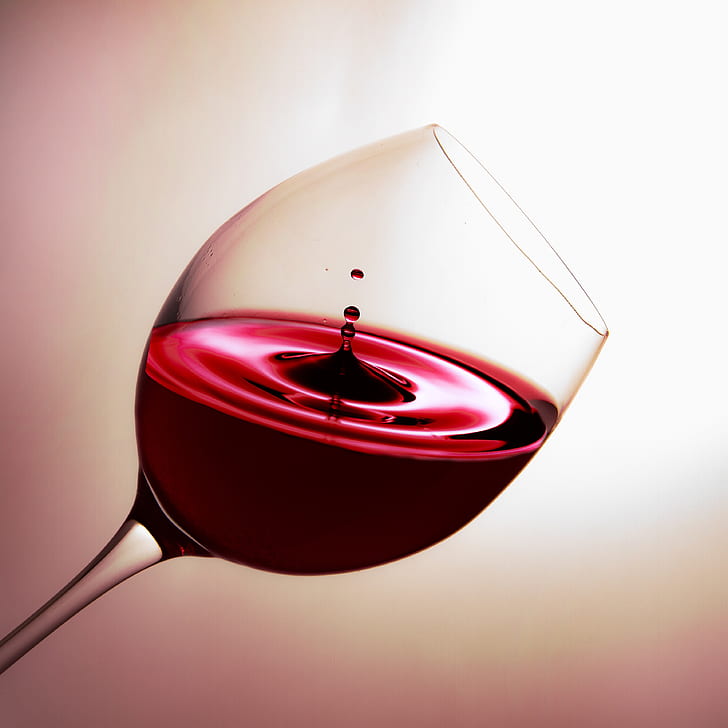 clear wine glass with red wine