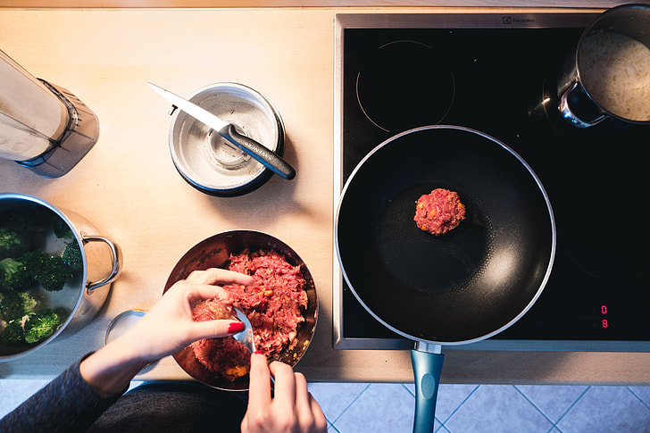 Frying ground beef burger meat