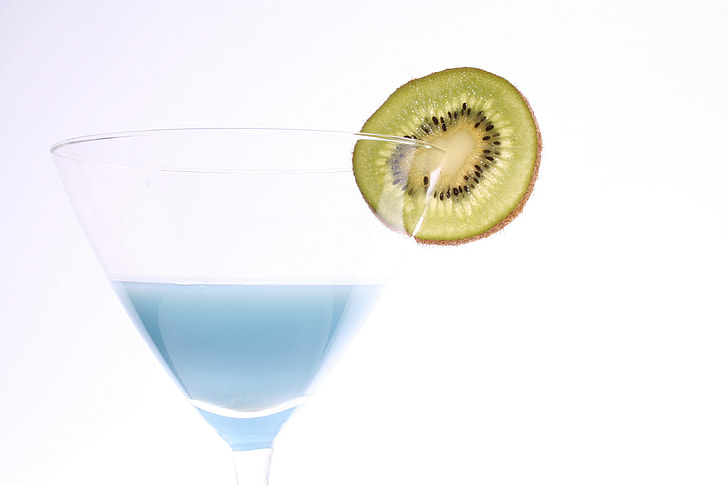 sliced kiwi on clear martini glass