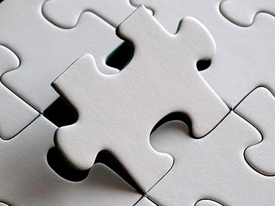 white jigsaw puzzle piece