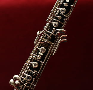 Gray Instrument on Red Textile