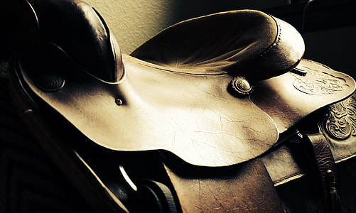 close shot of brown leather horse saddle