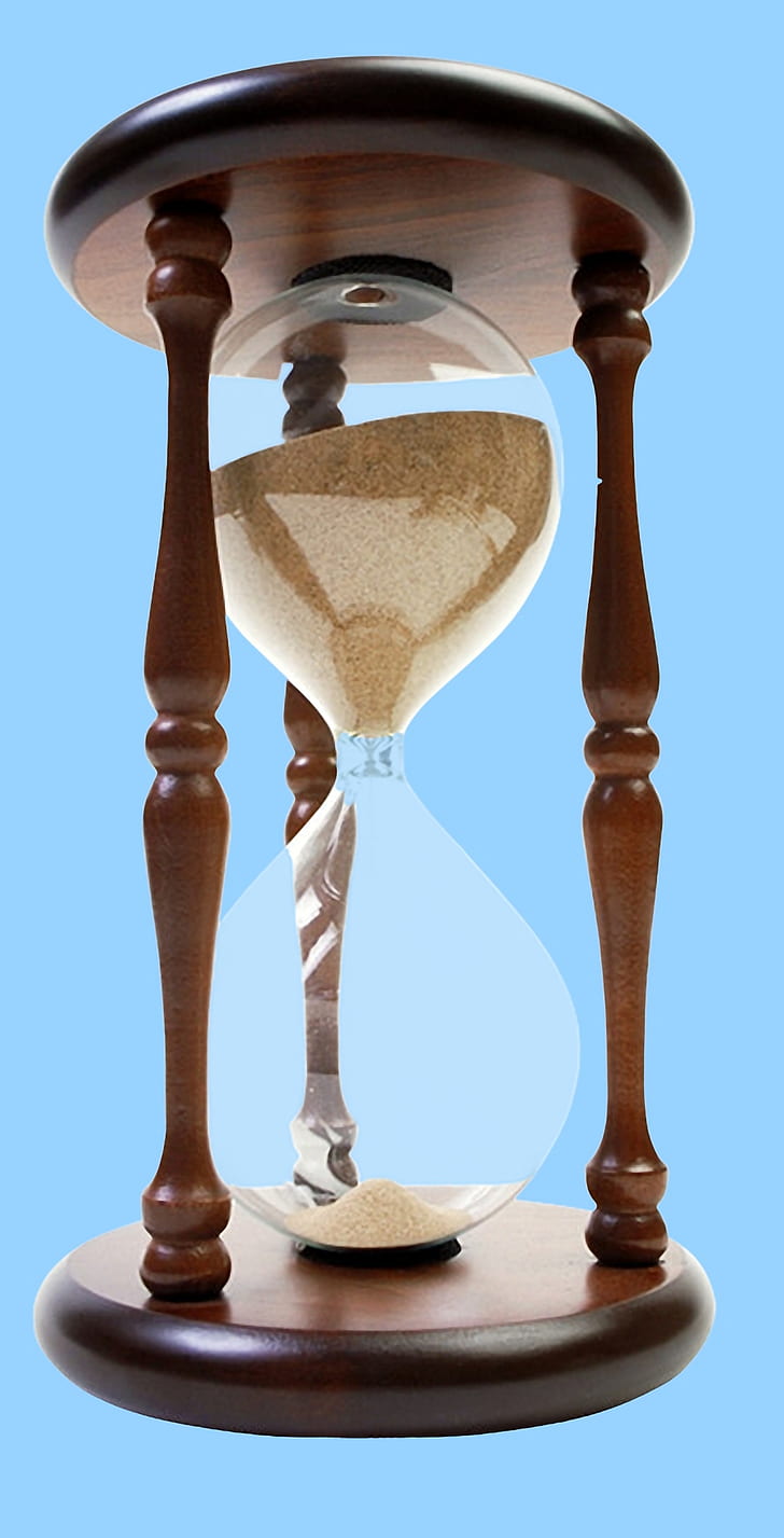 brown wooden framed sand hourglass