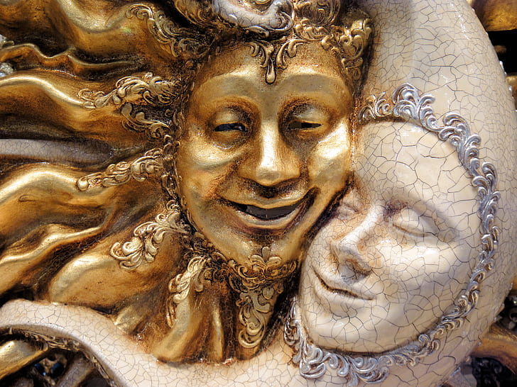 sun and half-moon statuette