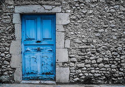 blue wooden 4-panel door close