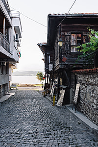 Narrow streets with old houses in the old town Nessebar, Bulgaria
