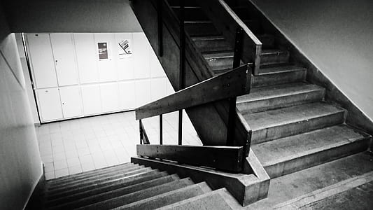 Grayscale Photo of Staircase