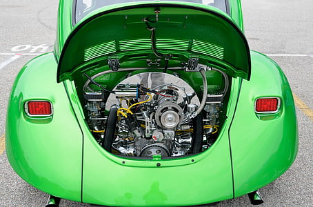 close up photo of green car engine bay