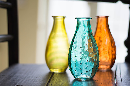 Closeup shot of glass vases on a house table