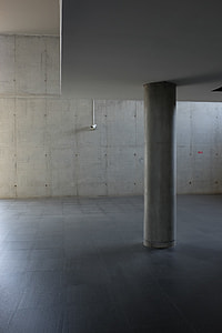 gray floor tiles and gray concrete wall