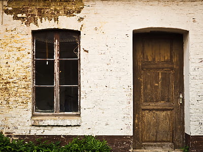 photograph of house with closed door and window