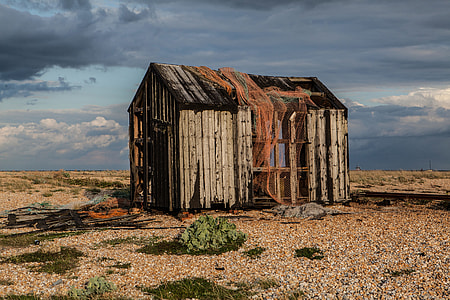 An abandoned old shack sits on the coast of Dungeness in Kent, England