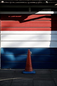 red and blue traffic cone