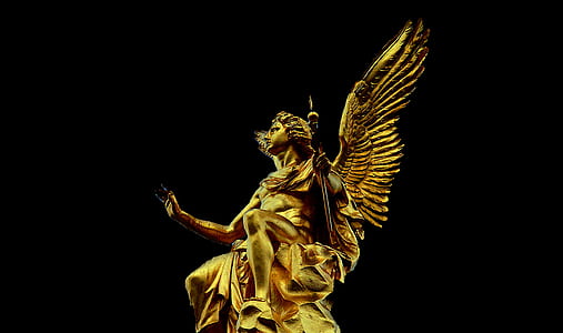 bottom view of gold-colored angel statue