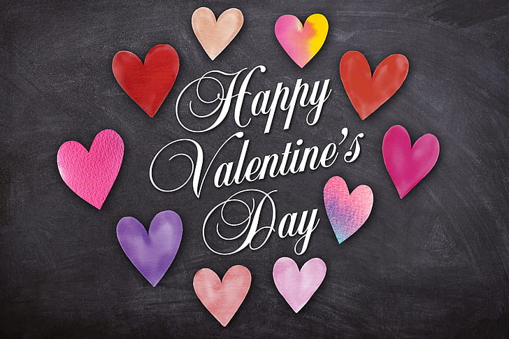 Happy Valentine's Day text on gray surface
