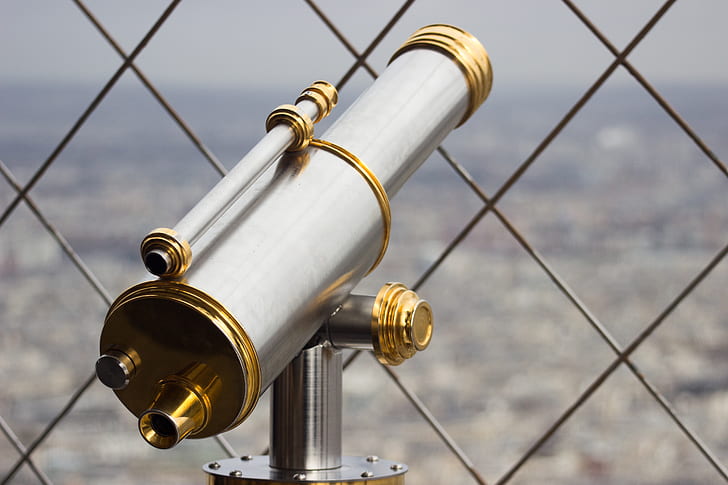gray and brass telescope