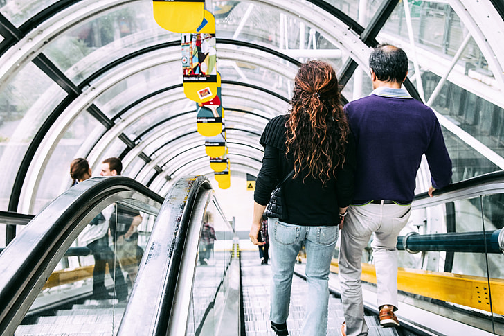 People going down the modern escalator at the Centre Pompidou in Central Paris, France. Image captured with a Canon 6D