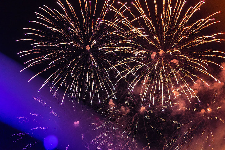 Huge Colorful Fireworks Pyrotechnics Against Black Night Sky