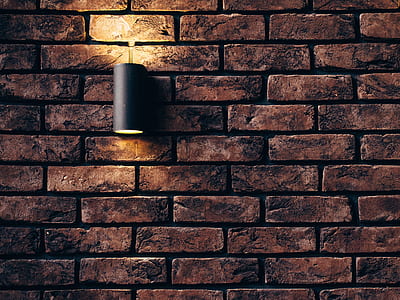 brick wall with sconce