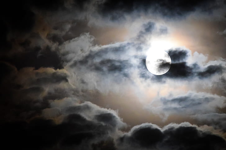 full moon and black clouds