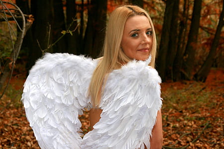 woman wearing white angel wing