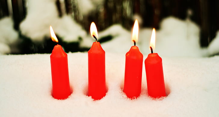 four red candles lighted